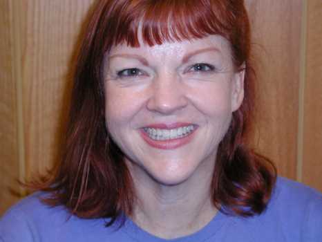 One happy smiling patient after gap is closed with invisible braces