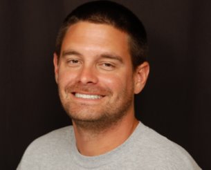 A happy patient whose peg lateral incisors was restored with porcelain laminates